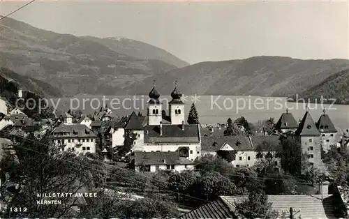 AK / Ansichtskarte Millstatt Millstaettersee Ortsansicht mit Kirche Alpen Kat. Millstatt Millstaetter See