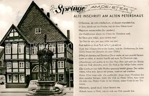 AK / Ansichtskarte Springe Deister Alte Inschrift am alten Petershaus Fachwerkhaus Brunnen Kat. Springe