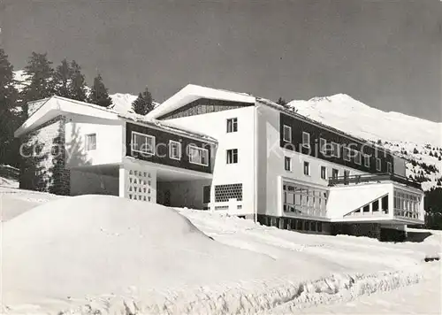 AK / Ansichtskarte Lenzerheide GR Casa Fadail Jugendhaus der St Luziusstiftung Winterpanorama Alpen