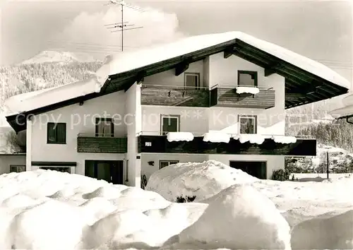 AK / Ansichtskarte Koessen Tirol Fruehstueckspension Ambrusch im Winter Kat. Koessen