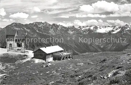 AK / Ansichtskarte Klosters GR Gotschnagrat Bergstation Berghuette mit Silvrettagruppe Kat. Klosters