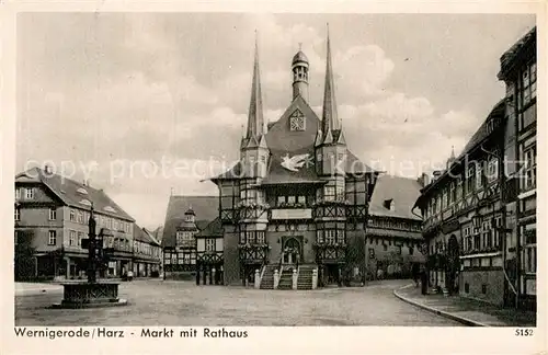 AK / Ansichtskarte Wernigerode Harz Markt mit Rathaus Brunnen Altstadt Fachwerkhaeuser Kat. Wernigerode
