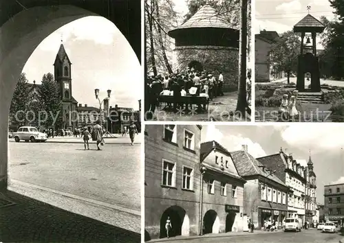 AK / Ansichtskarte Tarnowskie Gory Tarnowitz Marktplatz Historische Haeuser Glockenturm