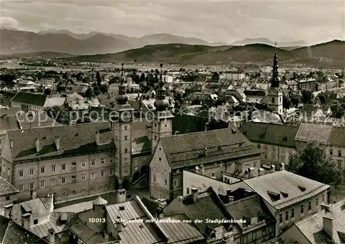 AK / Ansichtskarte Klagenfurt Woerthersee Fliegeraufnahme Landhaus Pfarrkirche