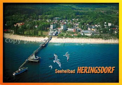 AK / Ansichtskarte Heringsdorf Ostseebad Usedom Fliegeraufnahme mit Strand und Seebruecke Kat. Heringsdorf