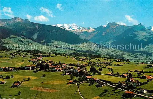 AK / Ansichtskarte Aeschi BE Gesamtansicht mit Alpenpanorama