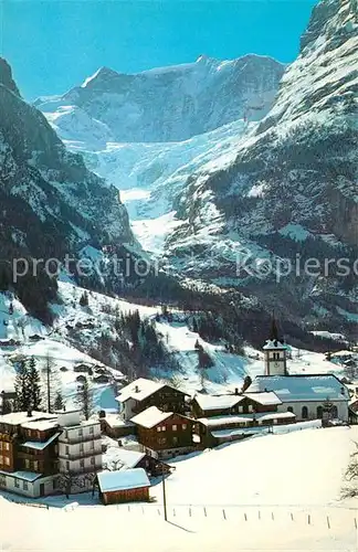 AK / Ansichtskarte Grindelwald Dorfpartie Winterpanorama Fiescherhoerner Berner Alpen Kat. Grindelwald