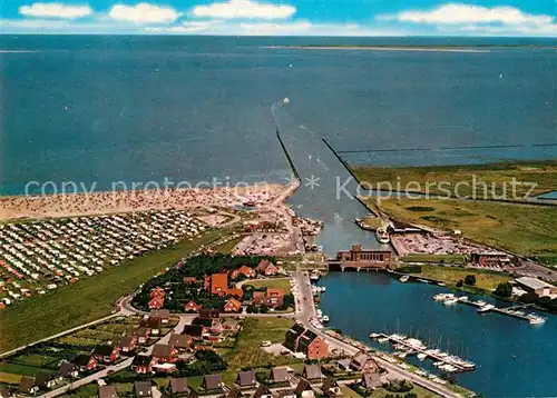 AK / Ansichtskarte Carolinensiel Ostfriesland Fliegeraufnahme mit Hafen und Strand Kat. Wittmund