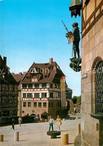 AK / Ansichtskarte Nuernberg Albrecht Duerer Haus Statue Altstadt Fachwerkhaeuser Kat. Nuernberg