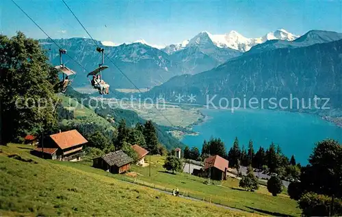 AK / Ansichtskarte Niederhorn Sesselbahn mit Eiger Moench und Jungfrau Thunersee Kat. Niederhorn