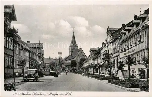 AK / Ansichtskarte Bad Sachsa Harz Strassenpartie Blick auf Kirche Hotel Ratskeller Kat. Bad Sachsa