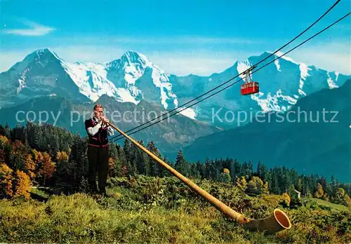 AK / Ansichtskarte Alphorn Alphornblaeser Eiger Moench Jungfrau Seilbahn Kat. Musik