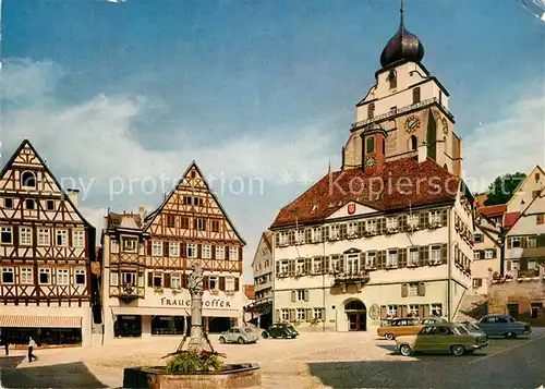 AK / Ansichtskarte Herrenberg Wuerttemberg Marktplatz Rathaus Stiftskirche