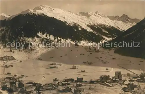 AK / Ansichtskarte Davos Dorf GR Winterpanorama Alpen Fliegeraufnahme Kat. Davos