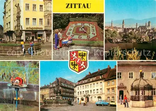 AK / Ansichtskarte Zittau Rolandsbrunnen Blumenuhr Schleifermaennchen Aug Bebel Platz mit Herkulesbrunnen Gruener Born am Stadtmuseum Kat. Zittau