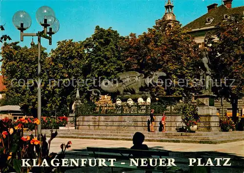 AK / Ansichtskarte Klagenfurt Woerthersee Neuer Platz Lindwurmbrunnen