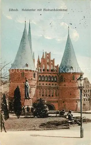 AK / Ansichtskarte Luebeck Holstentor mit Bismarckdenkmal Kat. Luebeck