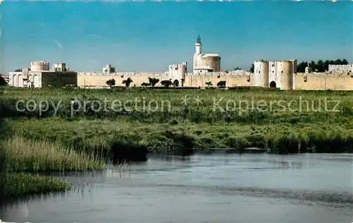 AK / Ansichtskarte Aigues Mortes Gard La Lagune Les remparts et la Tour de Constance Kat. Aigues Mortes