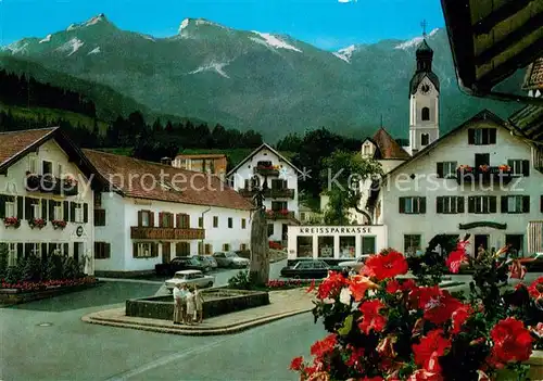 AK / Ansichtskarte Bad Kohlgrub Marktplatz Brunnen Kirche Kat. Bad Kohlgrub