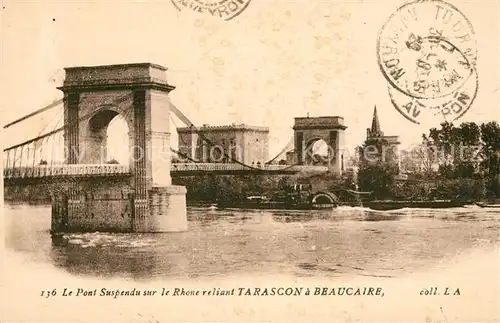AK / Ansichtskarte Tarascon Le Pont suspendu sur le Rhone reliant Tarascon a Beaucaire Kat. Tarascon