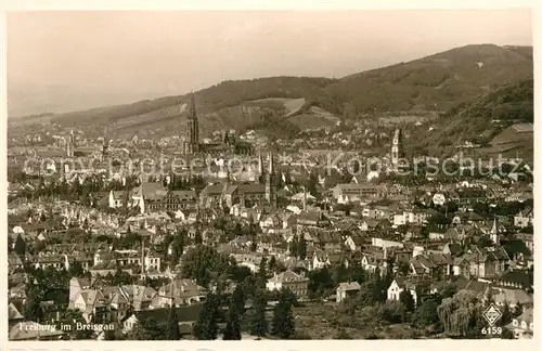 AK / Ansichtskarte Freiburg Breisgau Stadtpanorama mit Muenster Kat. Freiburg im Breisgau