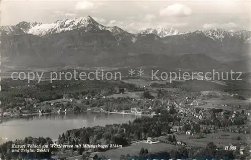 AK / Ansichtskarte Velden Woerthersee mit Mittagskogel und Triglav