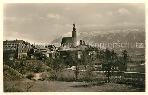 AK / Ansichtskarte Anger Chiemgau Ortsansicht mit Kirche Blick zum Untersberg Berchtesgadener Alpen