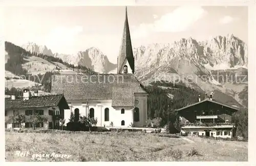 AK / Ansichtskarte Reit Winkl Ortsmotiv mit Kirche Blick gegen Kaisergebirge Kat. Reit im Winkl