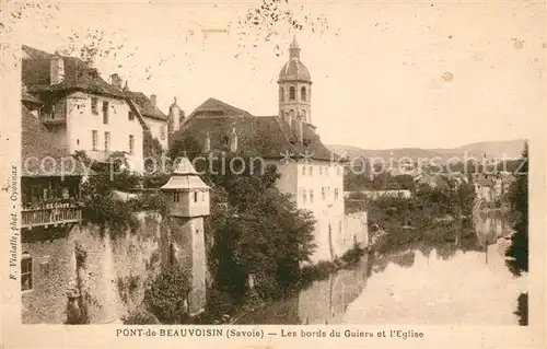 AK / Ansichtskarte Pont de Beauvoisin Ufer von Guiers Kirche Kat. Pont de Beauvoisin