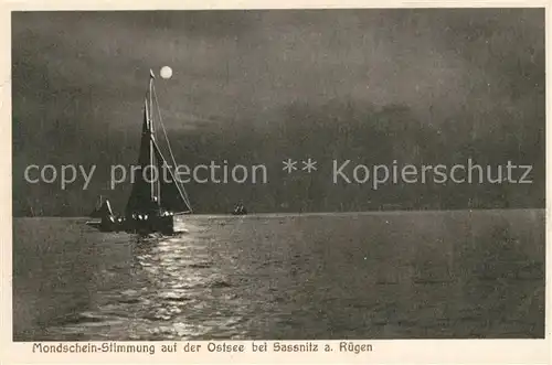 AK / Ansichtskarte Sassnitz Ostseebad Ruegen Mondschein Stimmung mit Segelboot Kat. Sassnitz