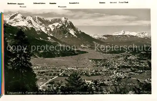 AK / Ansichtskarte Garmisch Partenkirchen Fliegeraufnahme gegen Zugspitzgruppe mit Tiroler Berge Kat. Garmisch Partenkirchen