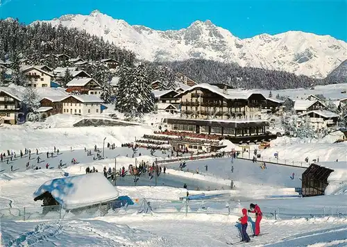 AK / Ansichtskarte Seefeld Tirol Eisstadion Hotel Wetterstein mit Wettersteingebirge Kat. Seefeld in Tirol