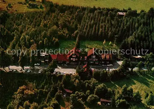 AK / Ansichtskarte Rhoenhaeuschen Berggasthof Pension in der hohen Rhoen Fliegeraufnahme