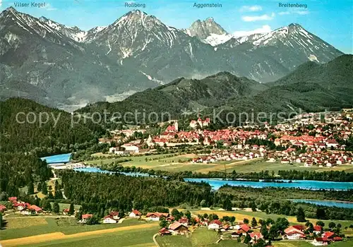 AK / Ansichtskarte Fuessen Allgaeu mit Allgaeuer Alpen und Tiroler Alpen Fliegeraufnahme Kat. Fuessen