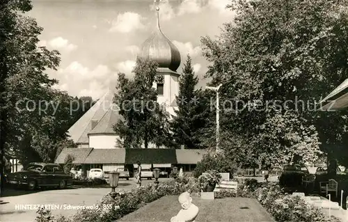 AK / Ansichtskarte Hinterzarten Ortsmotiv mit Kirche Kurort im Schwarzwald Kat. Hinterzarten