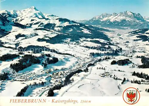 AK / Ansichtskarte Fieberbrunn Tirol Kaisergebirge Winter Fliegeraufnahme Kat. Fieberbrunn