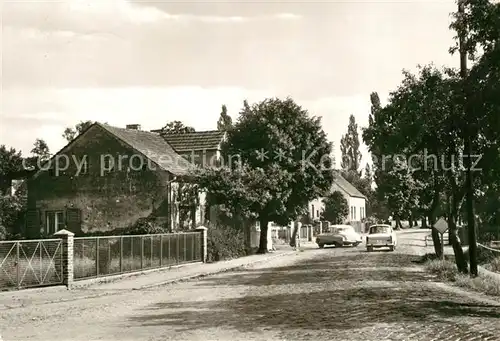 AK / Ansichtskarte Kolberg Wolziger See Dorfstrasse