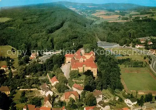AK / Ansichtskarte Bad Iburg Teilansicht mit Schloss Fliegeraufnahme Kat. Bad Iburg