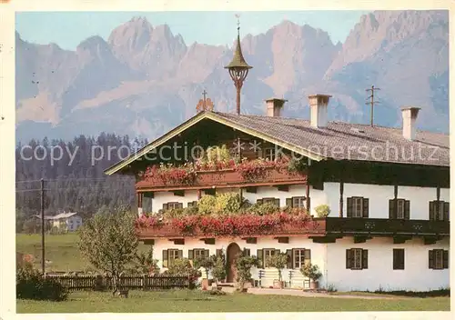 AK / Ansichtskarte Kitzbuehel Tirol Bauerngehoeft Blumenschmuck Wilder Kaiser Kaisergebirge Kat. Kitzbuehel