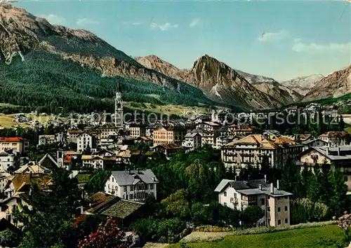 AK / Ansichtskarte Cortina d Ampezzo Stadtpanorama mit Dolomiten Kat. Cortina d Ampezzo