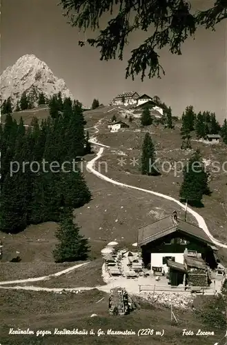 AK / Ansichtskarte Kreuzeckhaus mit Kreuzalm und Gr Waxenstein Kat. Garmisch Partenkirchen