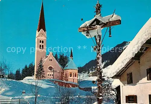 AK / Ansichtskarte Holzgau Dezembermorgen im Lechtal Ortsmotiv mit Kirche Inri Kat. Holzgau