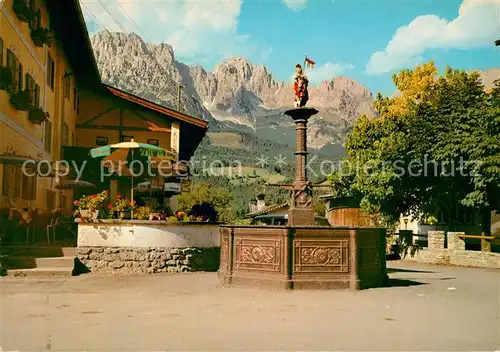 AK / Ansichtskarte Ellmau Tirol am Wilden Kaiser Dorfbrunnen Kat. Ellmau