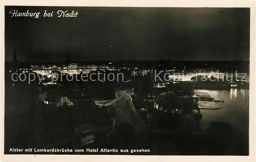 AK / Ansichtskarte Hamburg Alster Lombardsbruecke vom Hotel Atlantic aus gesehen bei Nacht Kat. Hamburg