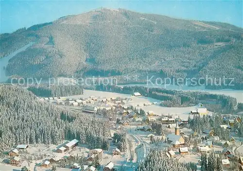 AK / Ansichtskarte Titisee mit Hochfirst Schwarzwald Winterlandschaft Thorbecke Luftbild Kat. Titisee Neustadt
