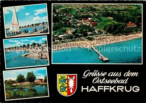 AK / Ansichtskarte Haffkrug Ostseebad Strand Seebruecke Fliegeraufnahme Wappen Kat. Scharbeutz