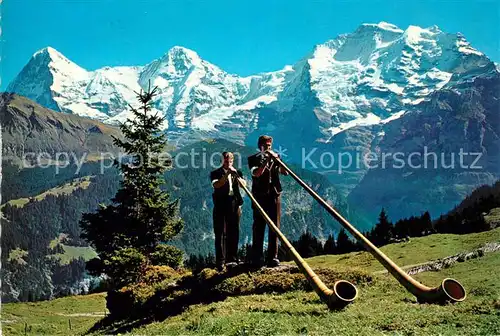 AK / Ansichtskarte Alphorn Alphornblaeser Muerren Eiger Moench Jungfrau Kat. Musik