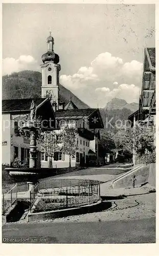 AK / Ansichtskarte Oberaudorf Dorfmotiv mit Kirche Kat. Oberaudorf