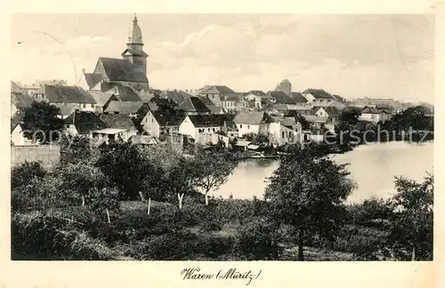 Waren Mueritz Haeuserpartie an der Mueritz mit Blick zur Kirche Mecklenburgische Seenplatte Kat. Waren Mueritz