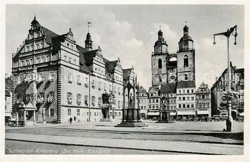 AK / Ansichtskarte Wittenberg Lutherstadt Marktplatz Rathaus Stadtkirche Lutherdenkmal Melanchthon Denkmal Kat. Wittenberg